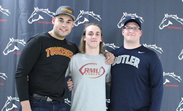 Football Signing Letters of Intent to Play