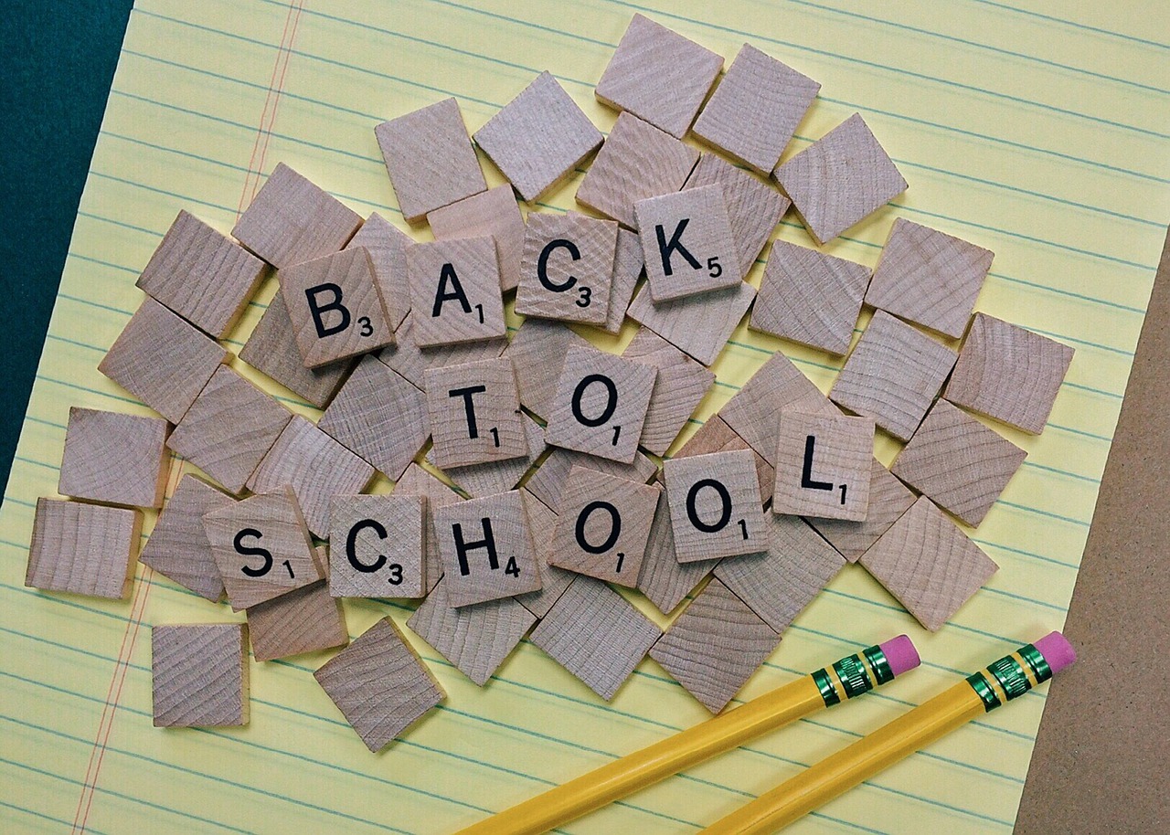 Scrabble pieces that form the words Back to School