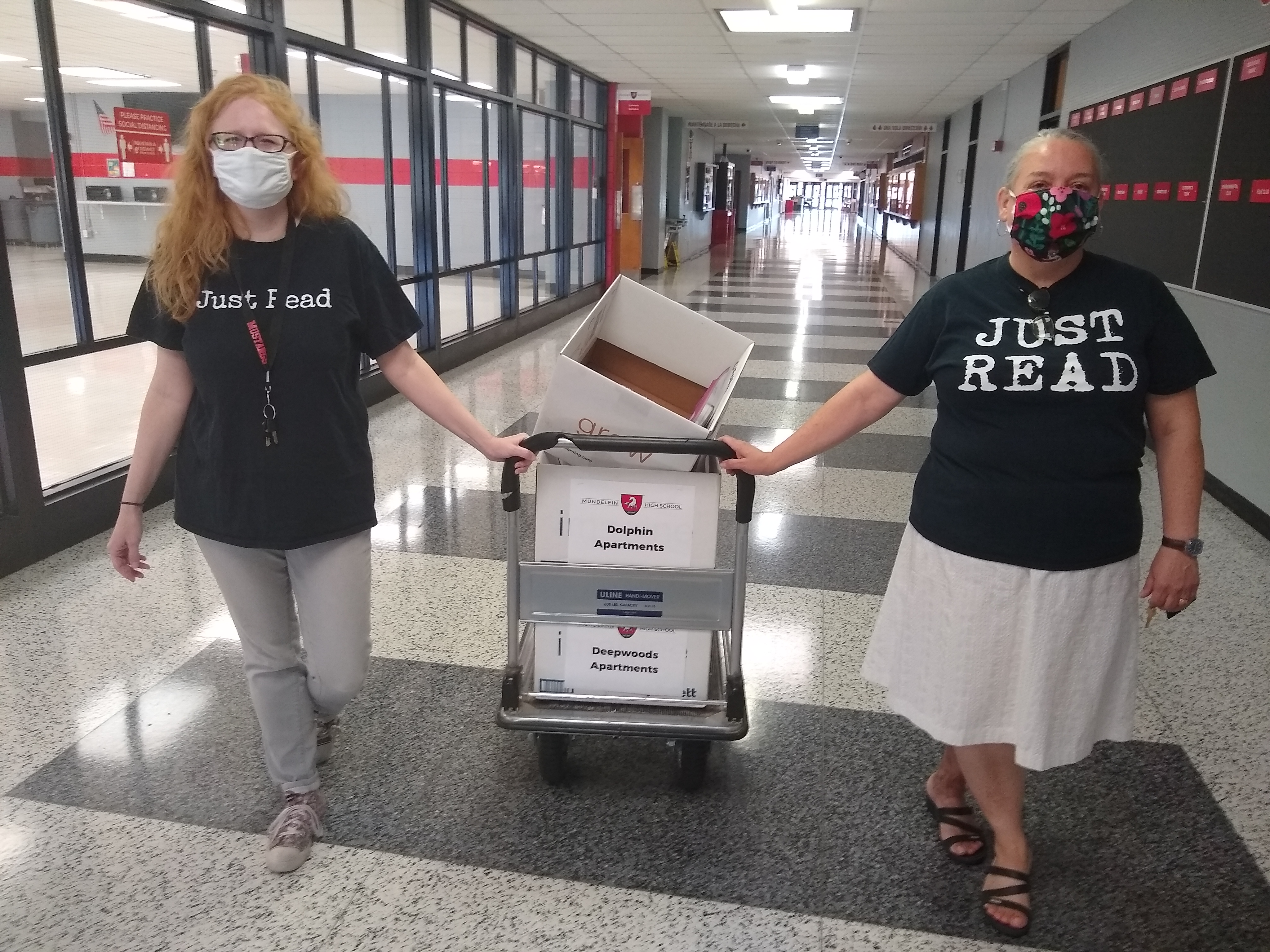 Rebecca Plaza and Stacey Klemstein return to MHS after delivering books for students.