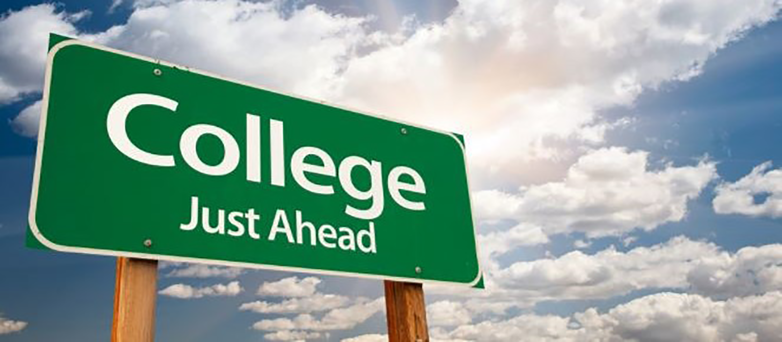 Green Street Sign the says "College Just Ahead"