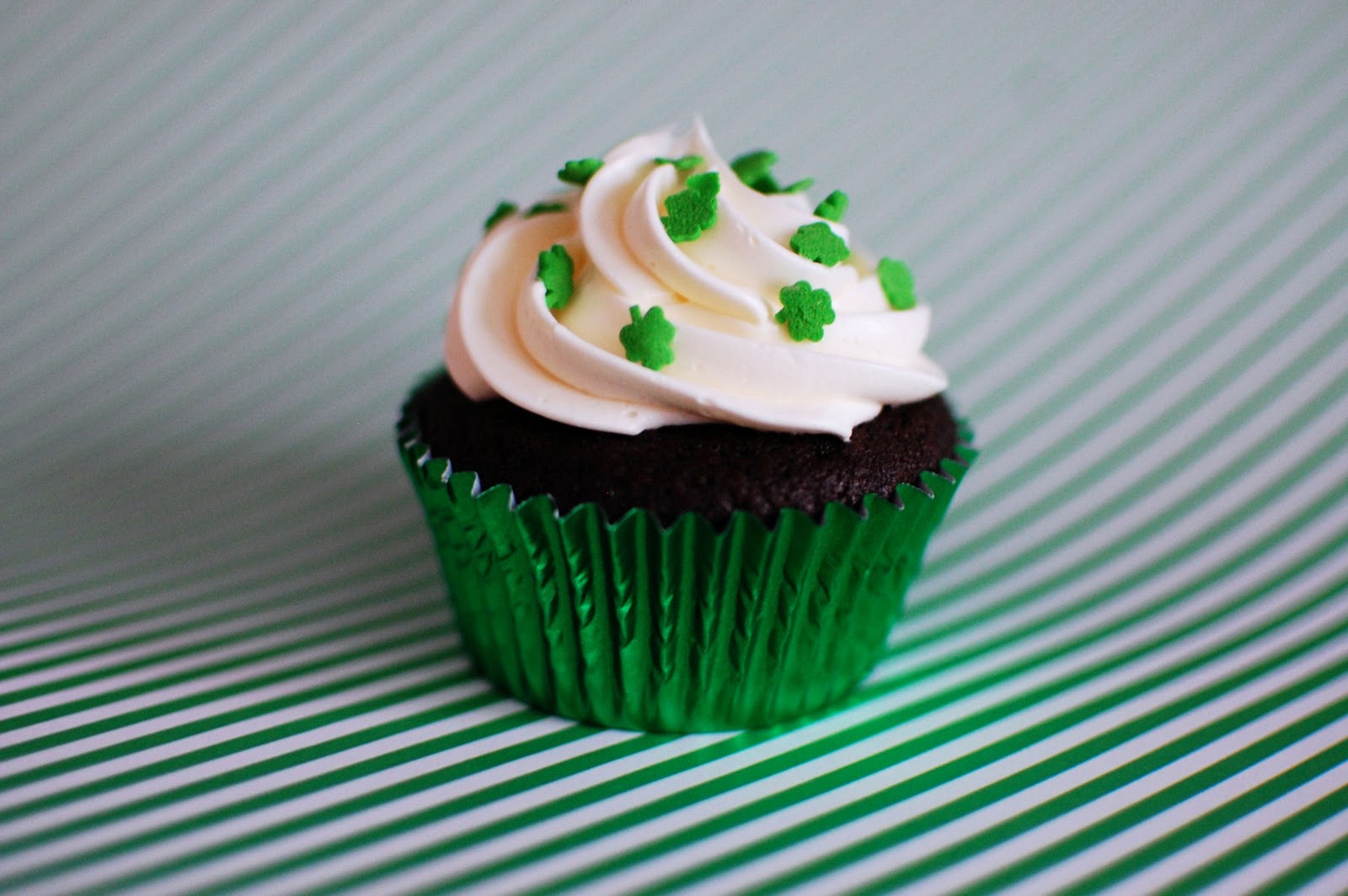 Photo of a chocolate cupcake with green frosting