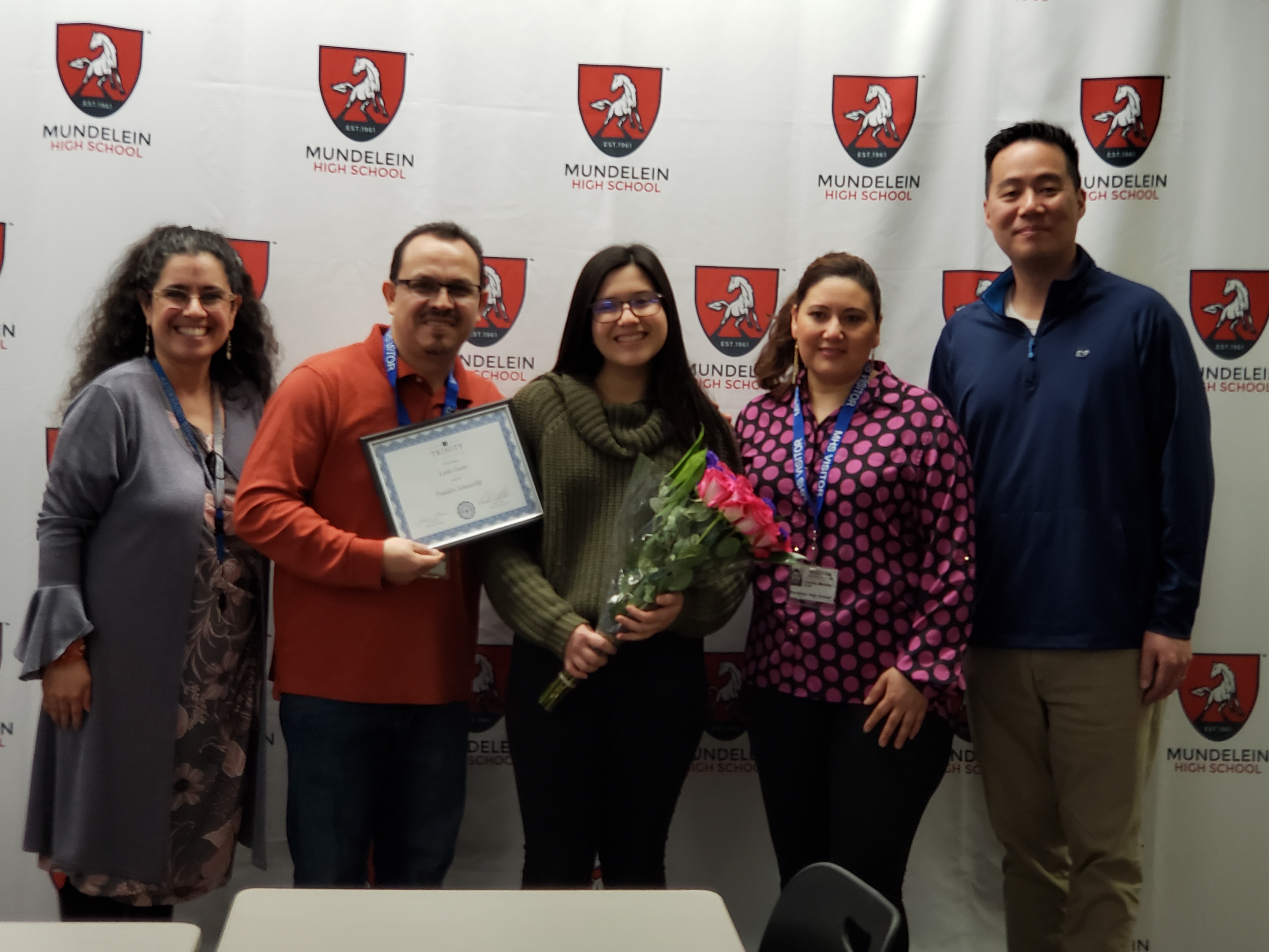 Leslie with her parents and counselors Jimmy Ku and Aracely Lawrence