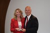 Dr. King receives her Distinguished Alumni Award from Superintendent Dr. Kevin Myers