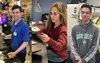Three students working on career communications