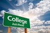 Roadside sign with "College Ahead" on it