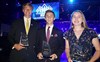 Three of the four honorees pose with their trophies