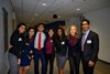 Seven of the award winners in group shot with arms around each other