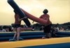 Two students having fun jousting