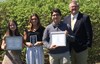 The award winners pose with their awards and with Mr. Meister