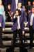 Matthew Callas holds the microphone while he performs a solo in competition