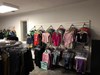 Rack of colorful clothing in the new location
