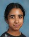 Formal headshot of Ms. Chandrasekar