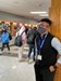Trey Baker stands in the hall of Mundelein High School.