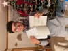 Trey holding up the signed book from President Obama