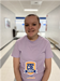 Photo of Natalia in the hallway of the Tech Campus wearing a CTE t-shirt