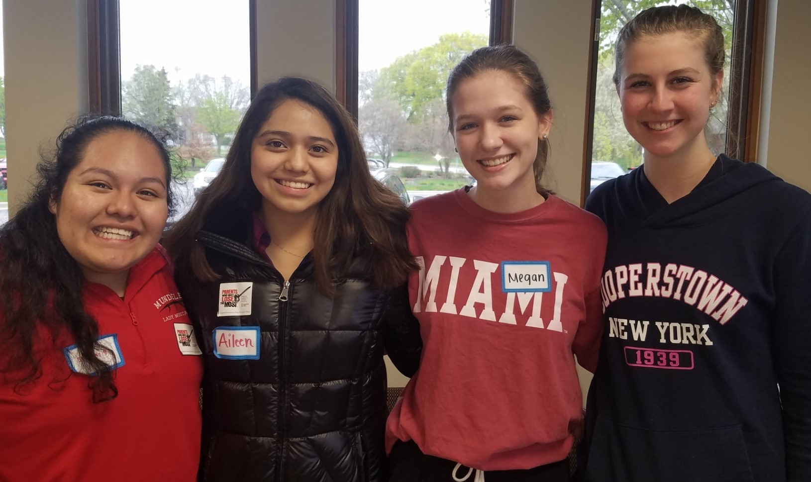 Photo of four girls who are members of the organization