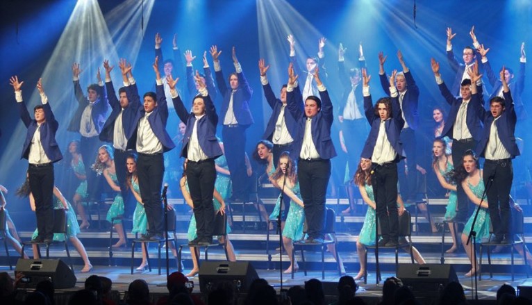 Sound, the mixed show choir, compete on stage