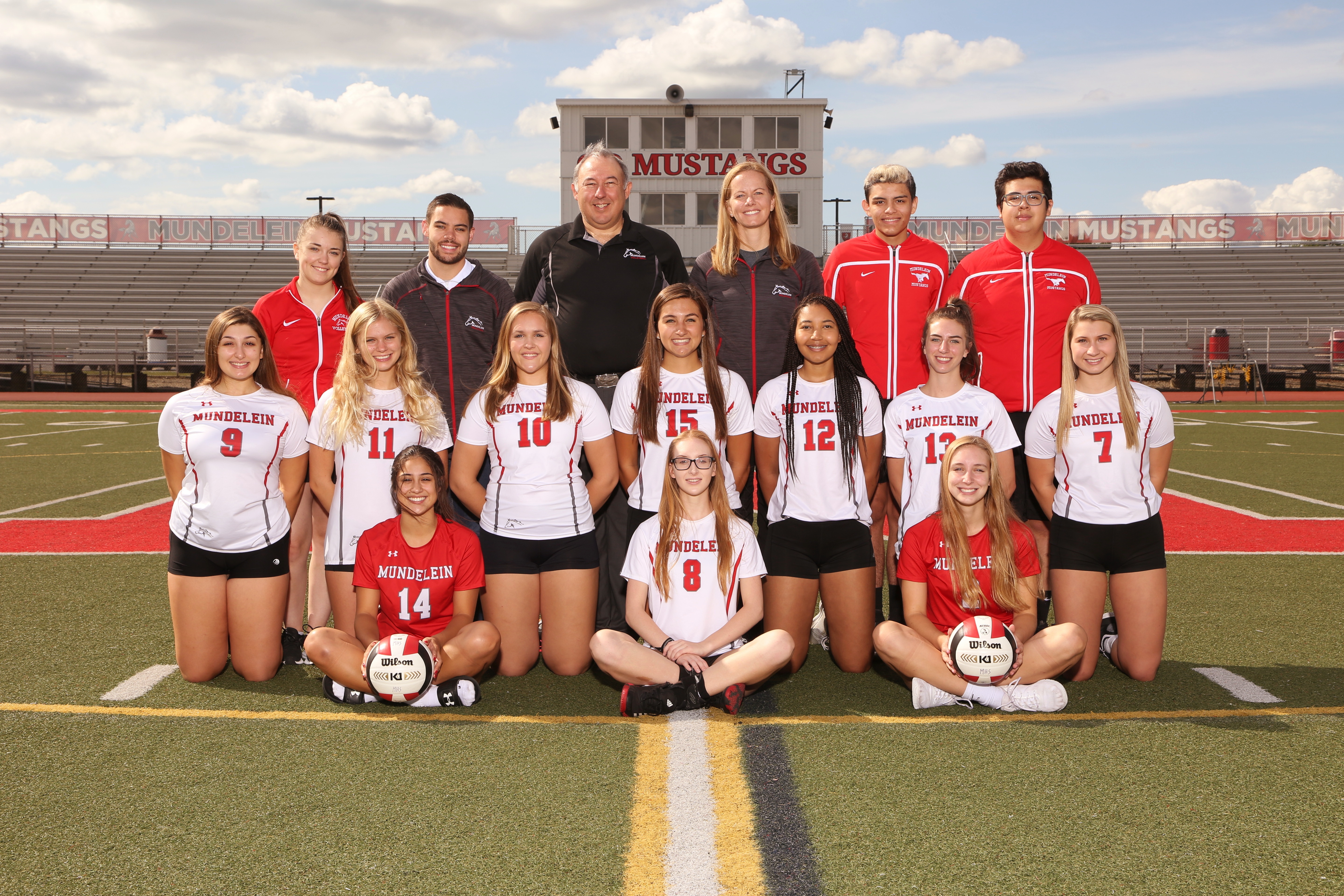 Formal photo of the team and coaches