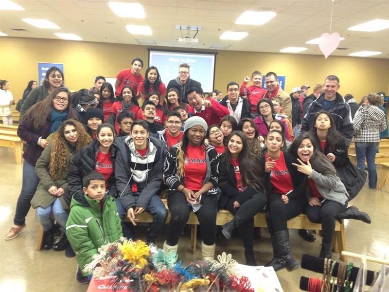 masc volunteering at feed my starving children